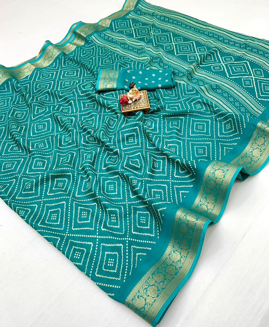 Teal Printed Moss Georgette Saree With Zari Border