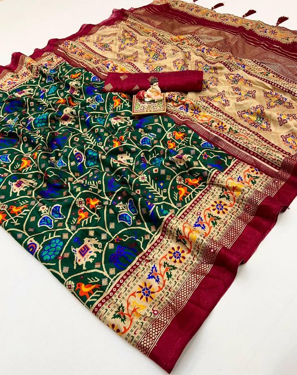 Traditional Bottle Green Patola Border Silk Saree