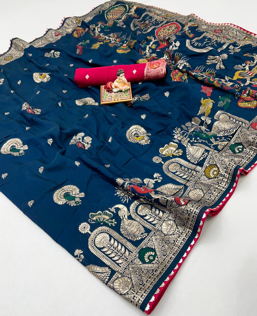 Designer Teal Blue Maslin Silk Saree With Woven Blouse