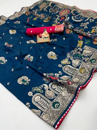 Designer Teal Blue Maslin Silk Saree With Woven Blouse