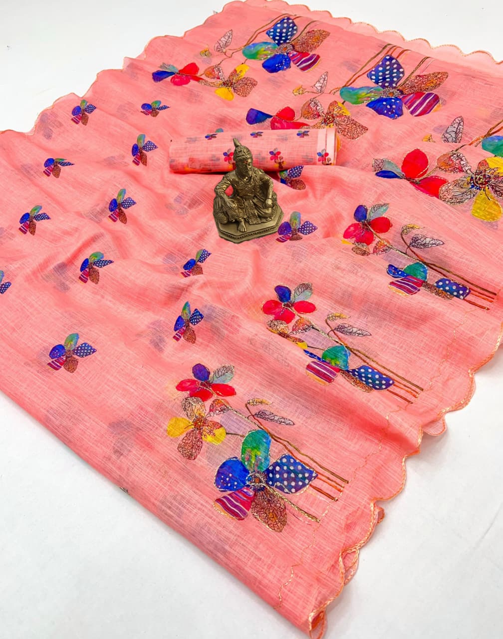Trendy Peach Linen Saree with Aari Work Blouse