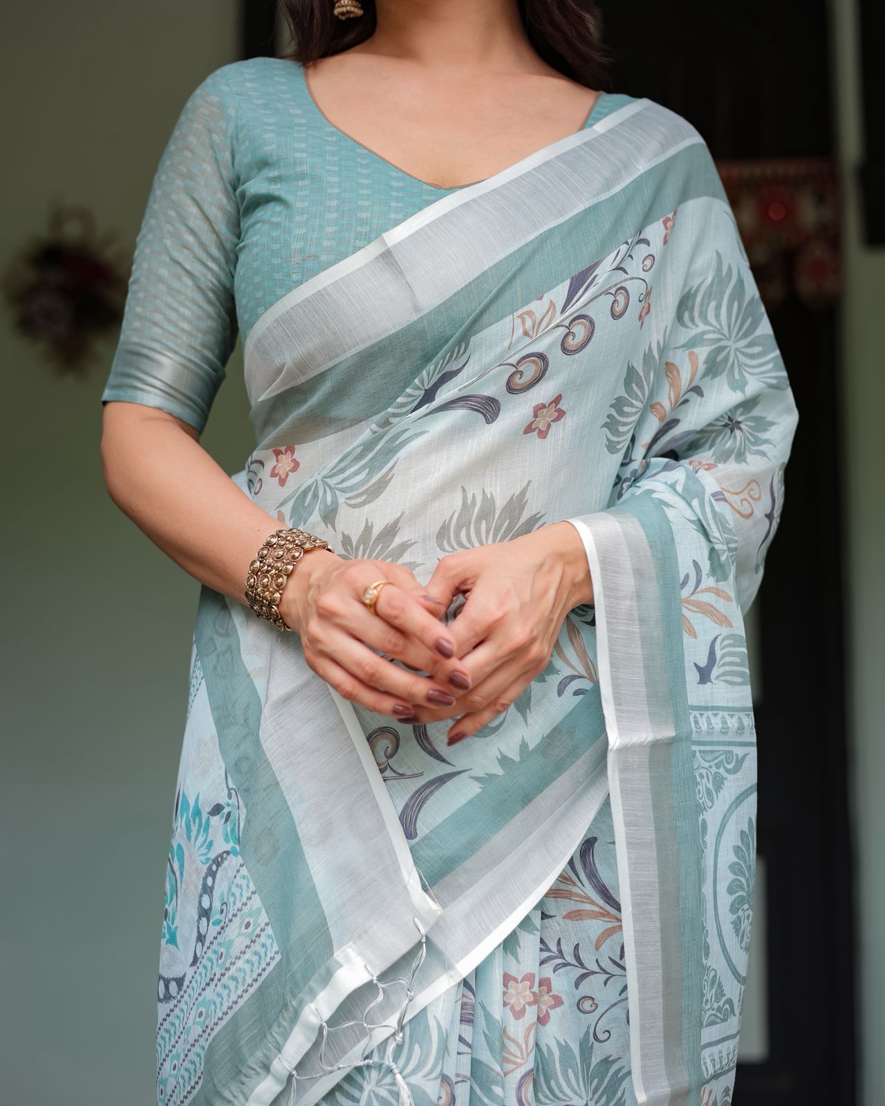 Pastel Green Linen Saree with Elegant Floral Print