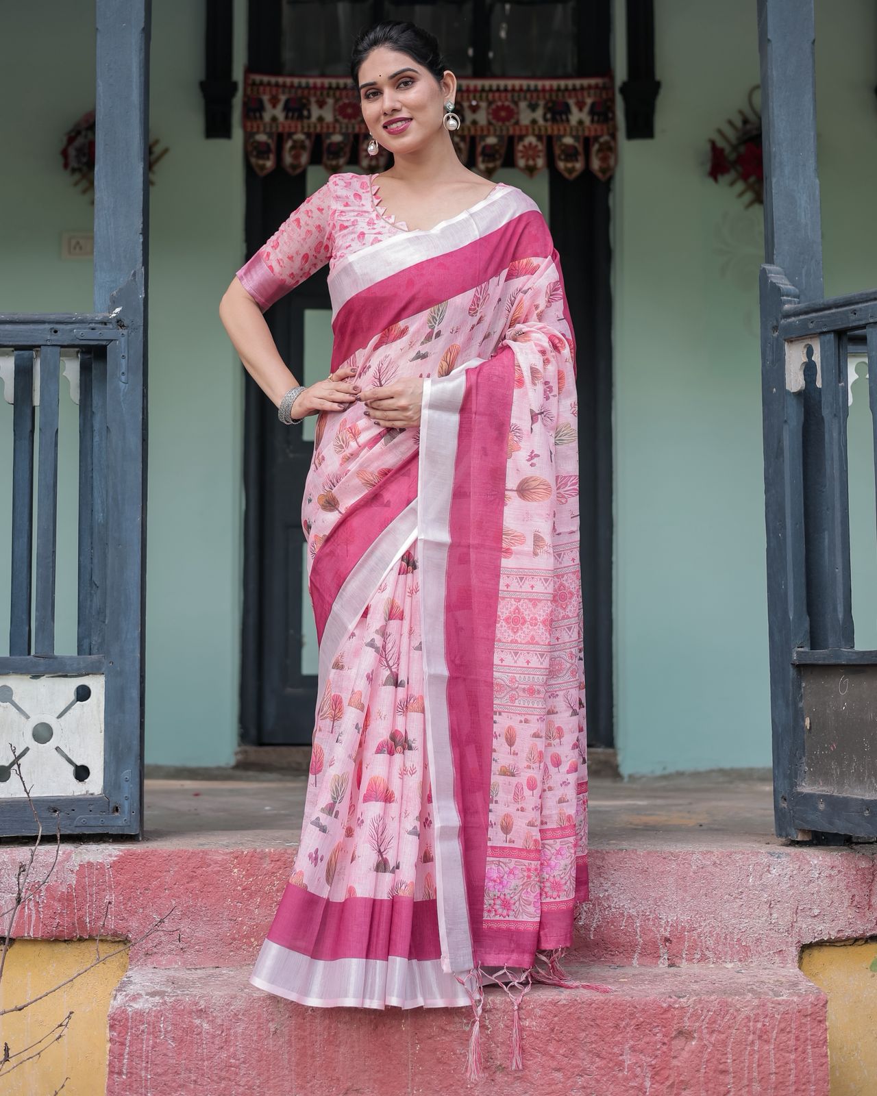 Soft Pink Floral Linen Saree with Elegant Border