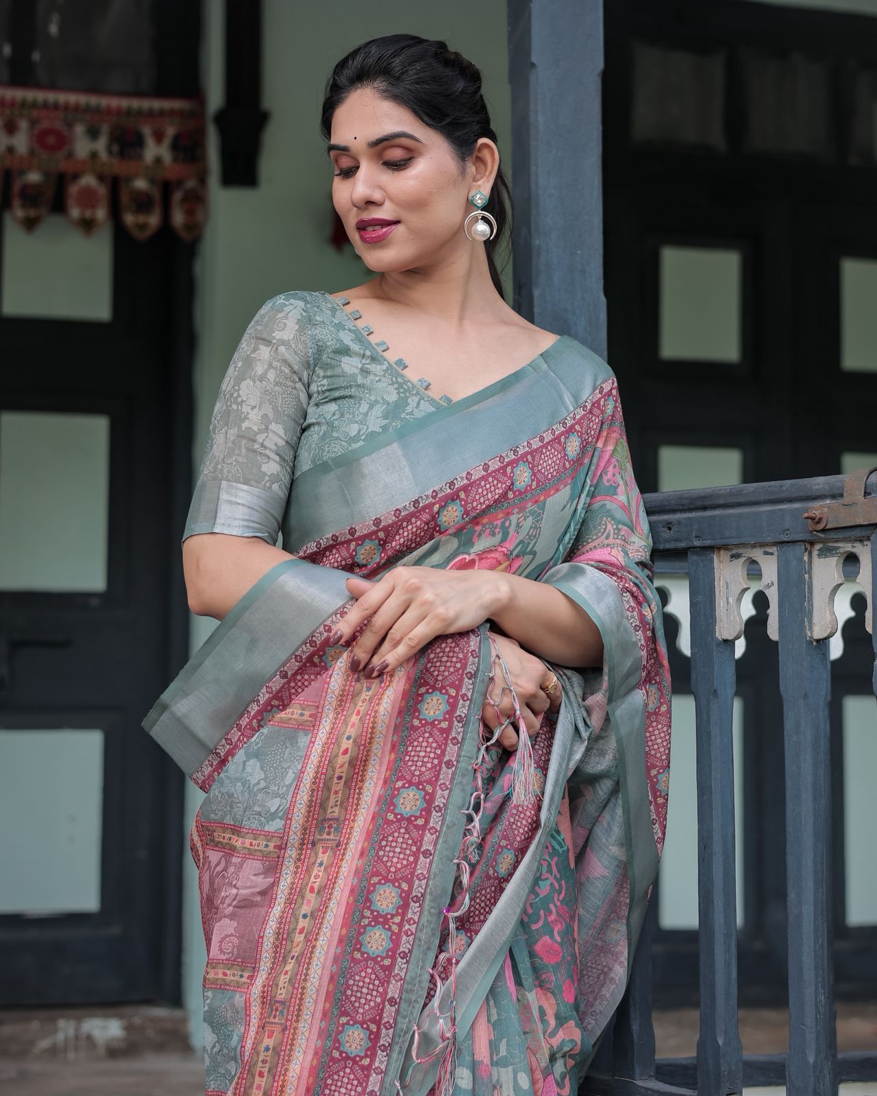 Teal Green Printed Linen Saree with Ethnic Border
