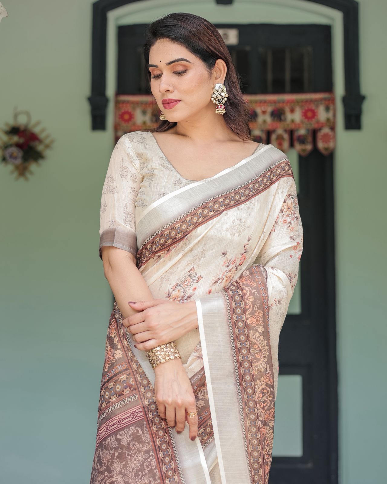 Graceful Beige Linen Saree with Traditional Designer Border