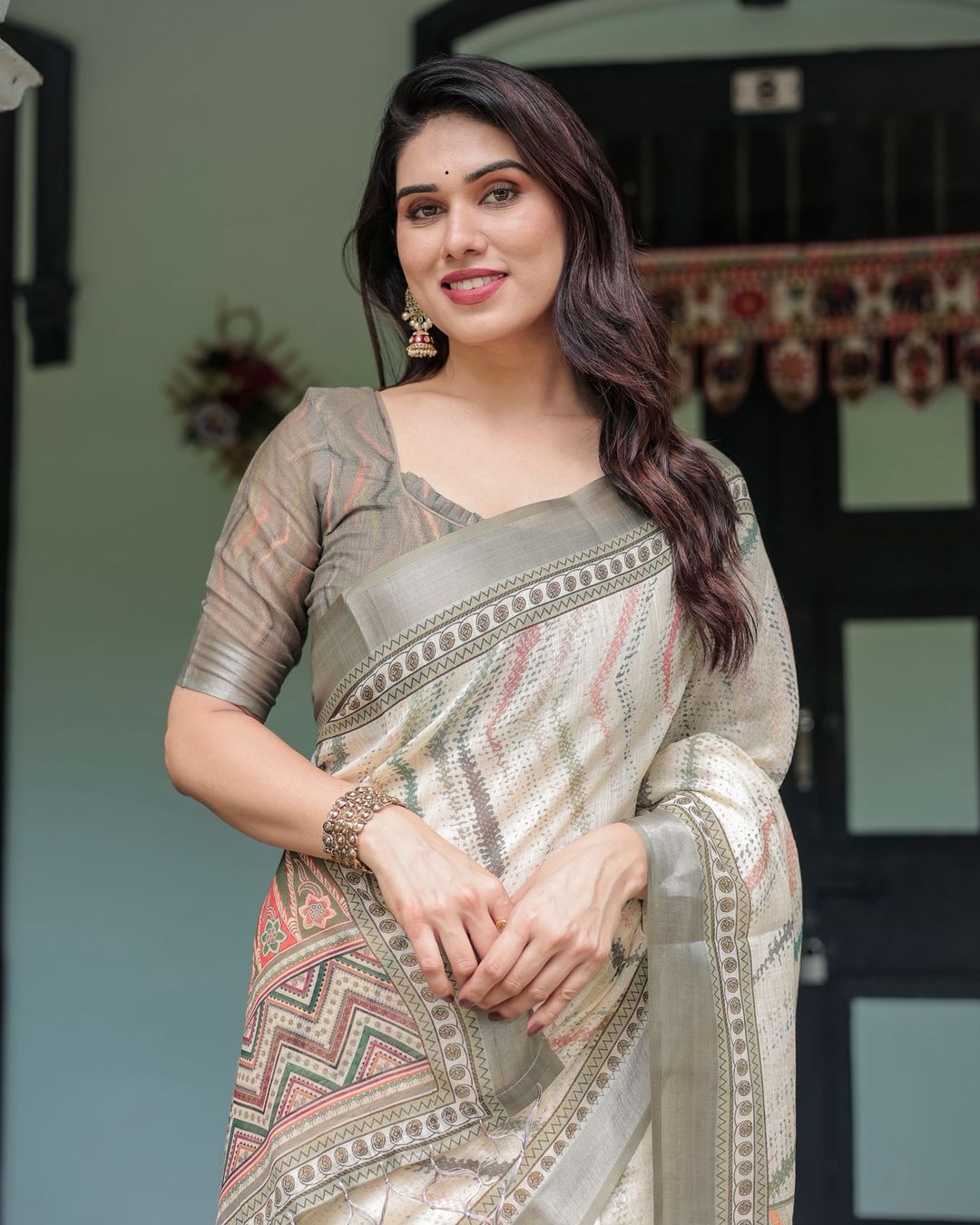 Elegant Pastel Green & Beige Linen Saree with Tribal Design
