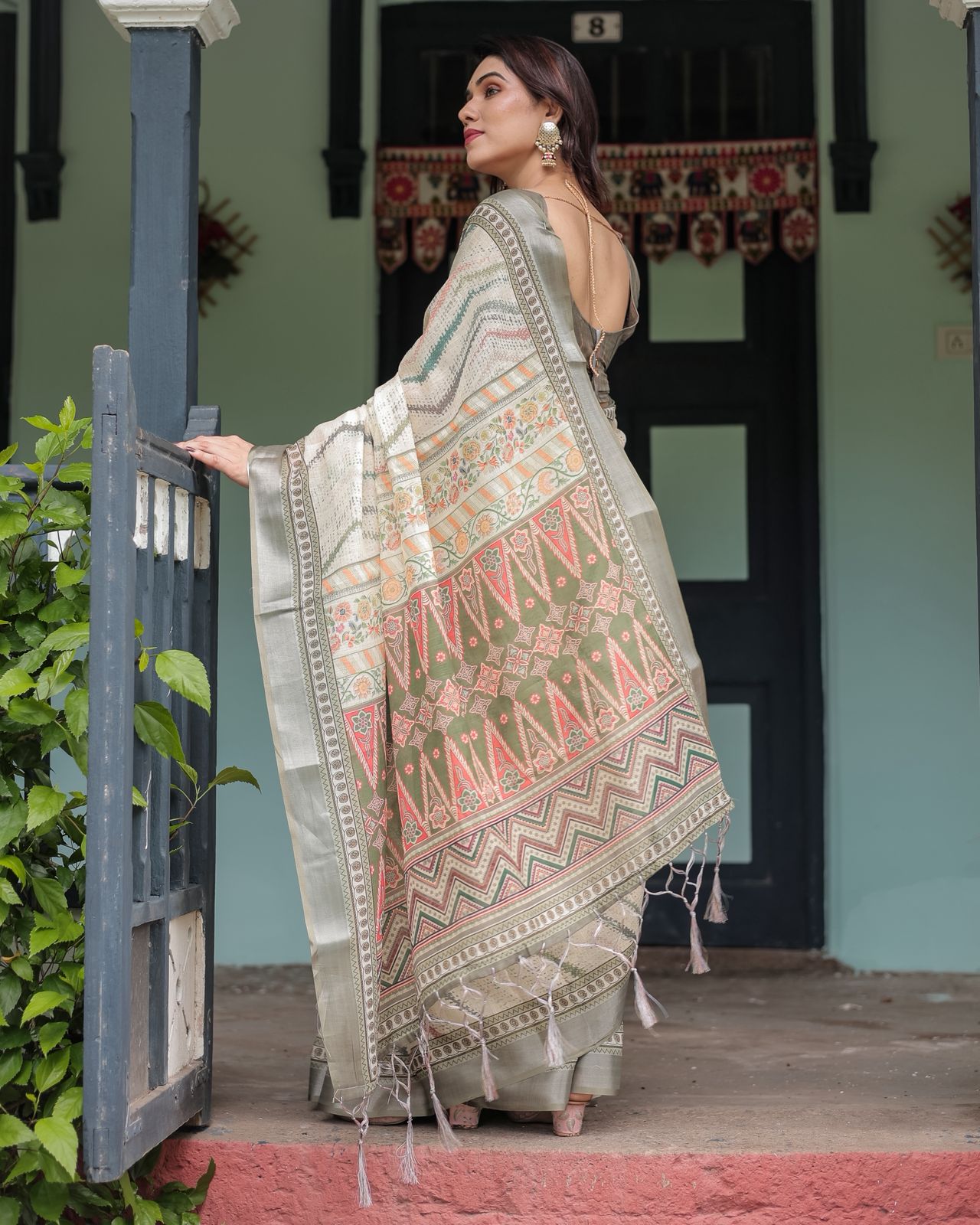 Elegant Pastel Green & Beige Linen Saree with Tribal Design