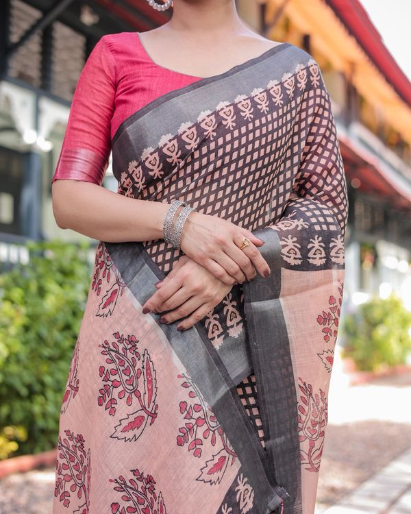 Elegant Peach Linen Saree with Bold Black Printed Border
