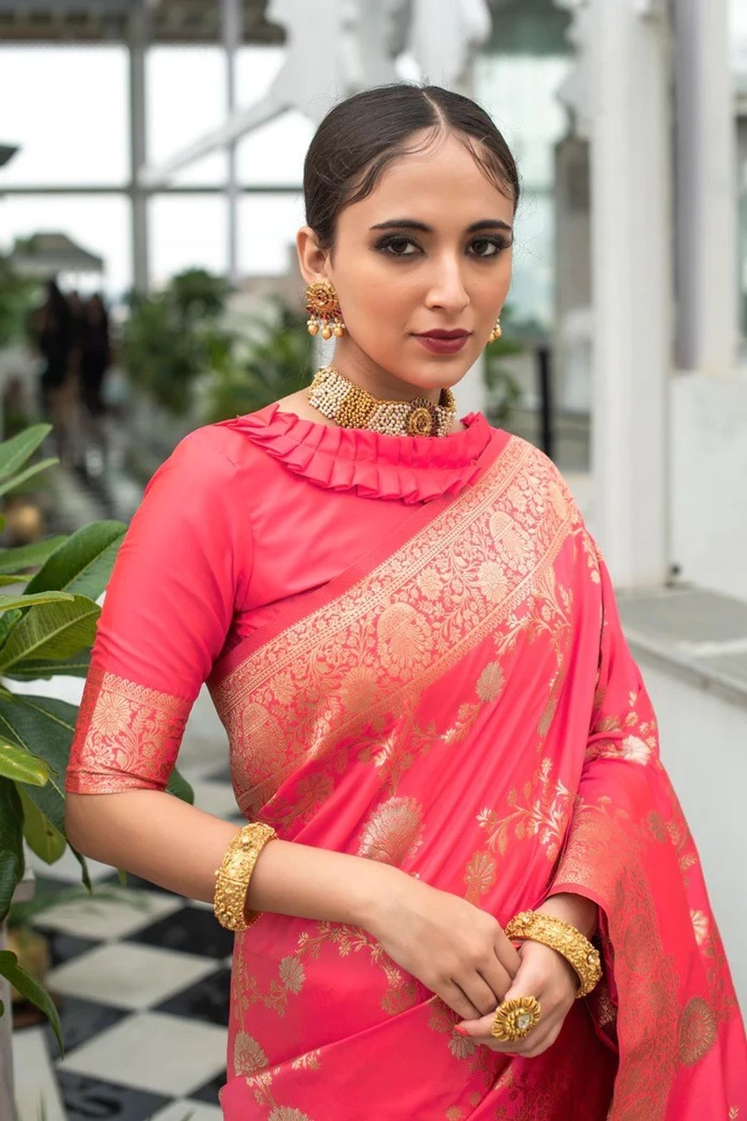 Coral Red Lichi Silk Saree with Rich Golden Zari Work