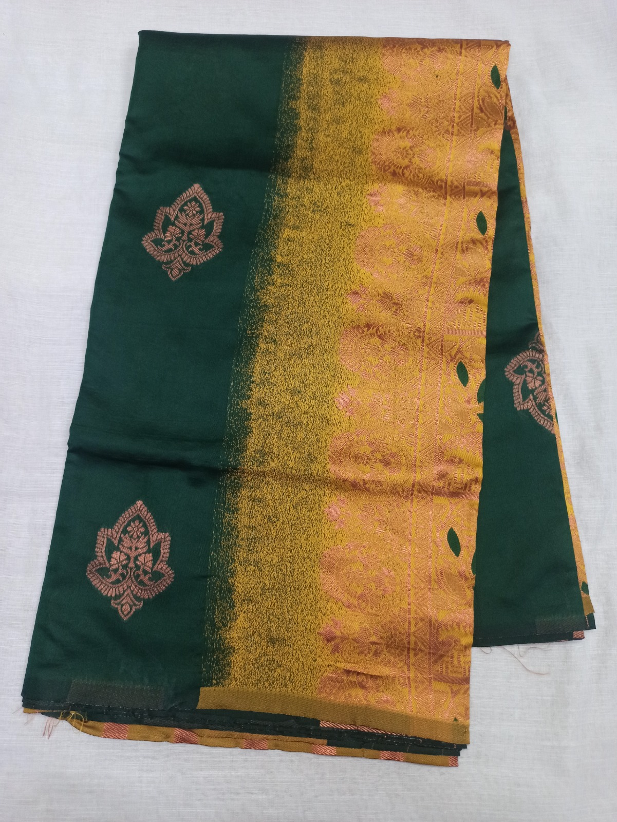 Bottle Green Lichi Silk Saree With Gold Jacquard Border