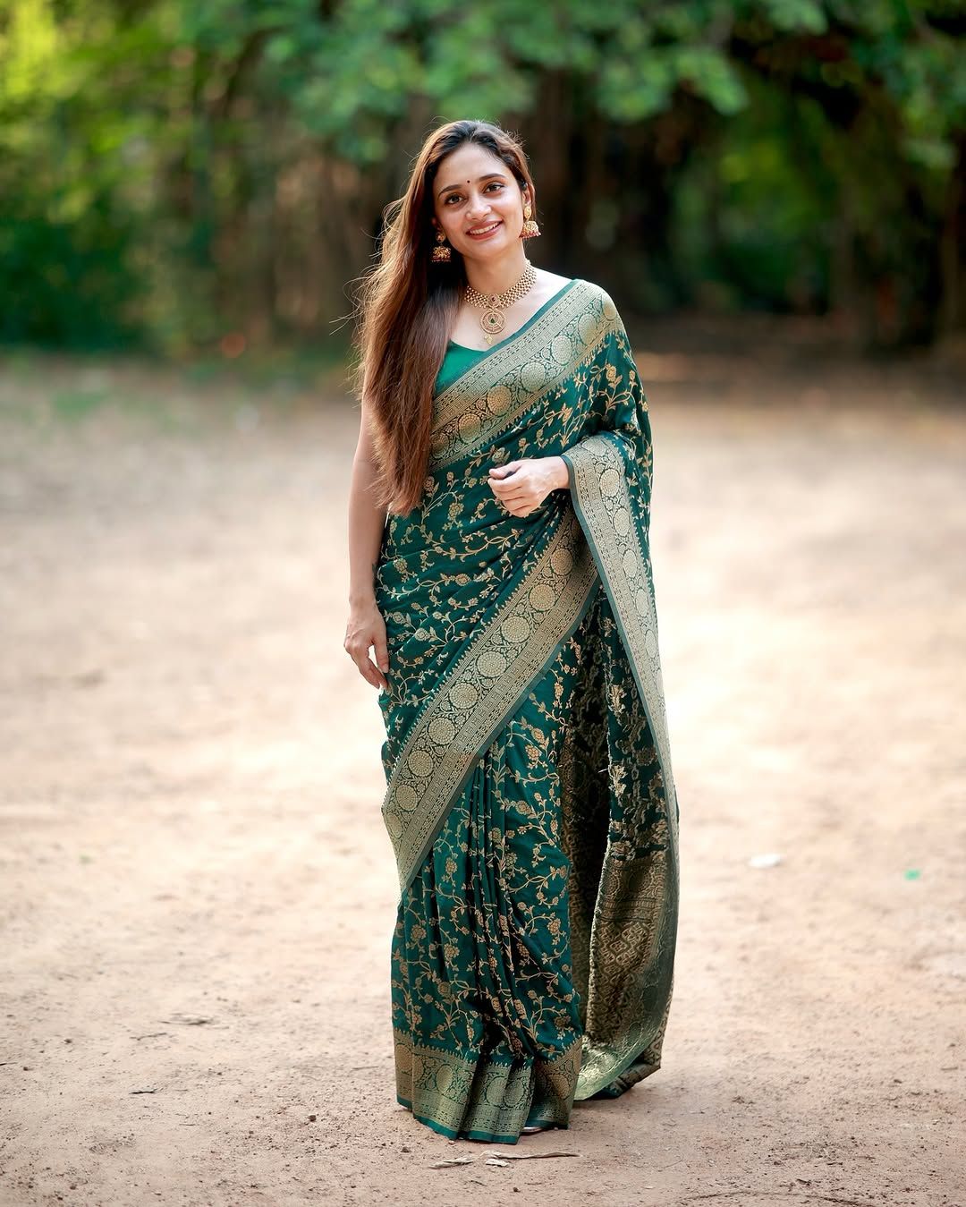 Wedding Wear Green Saree with Elegant Zari Finish