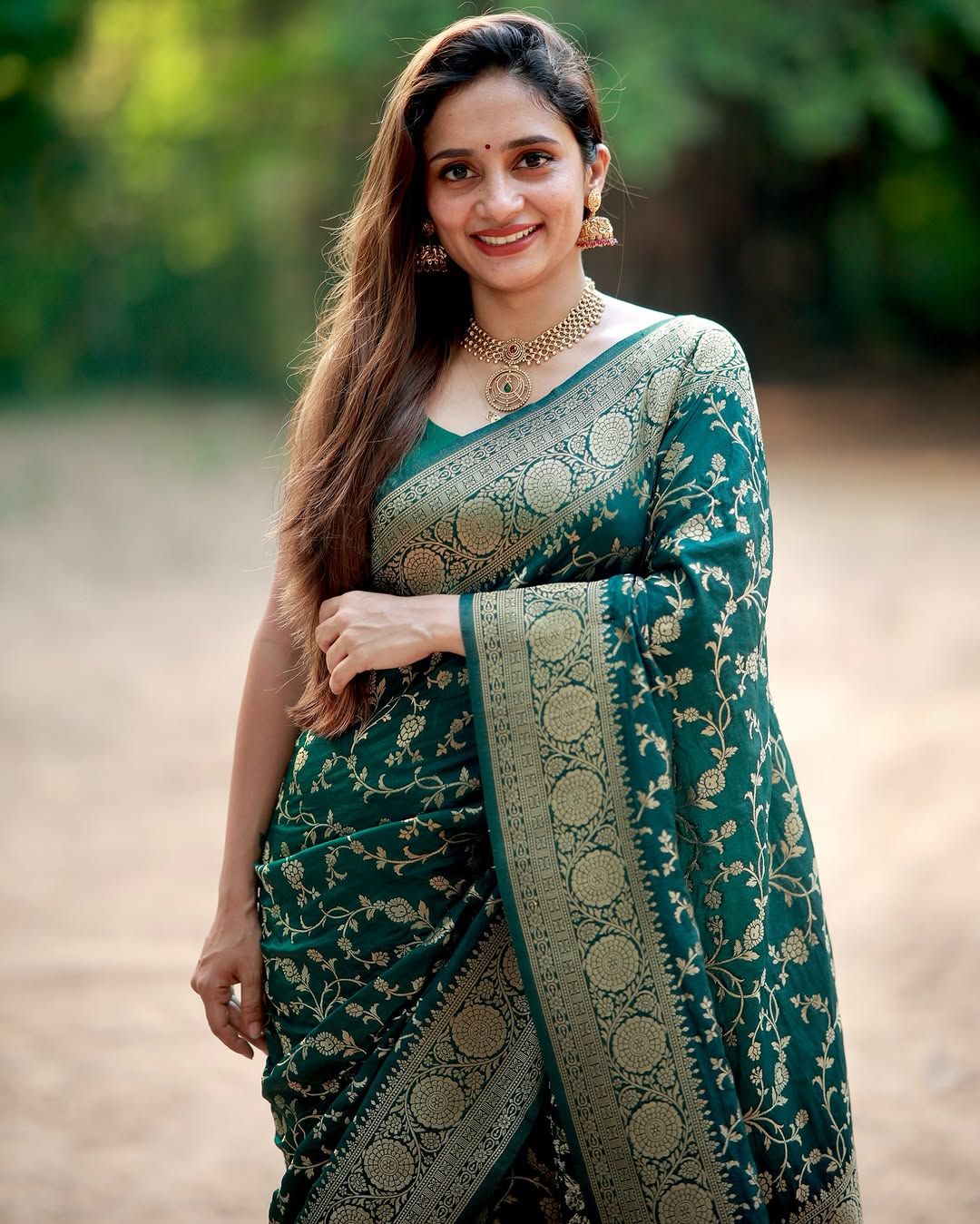 Wedding Wear Green Saree with Elegant Zari Finish