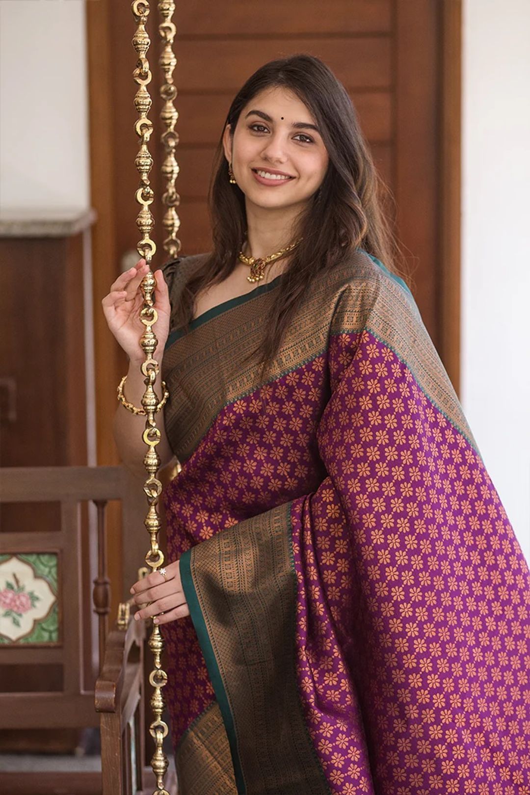 Traditional Purple Saree with Rich Green Border Design