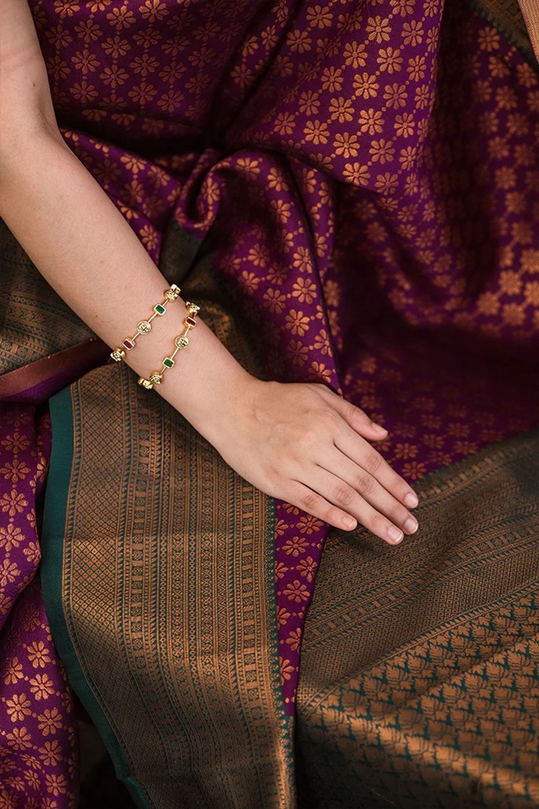 Traditional Purple Saree with Rich Green Border Design