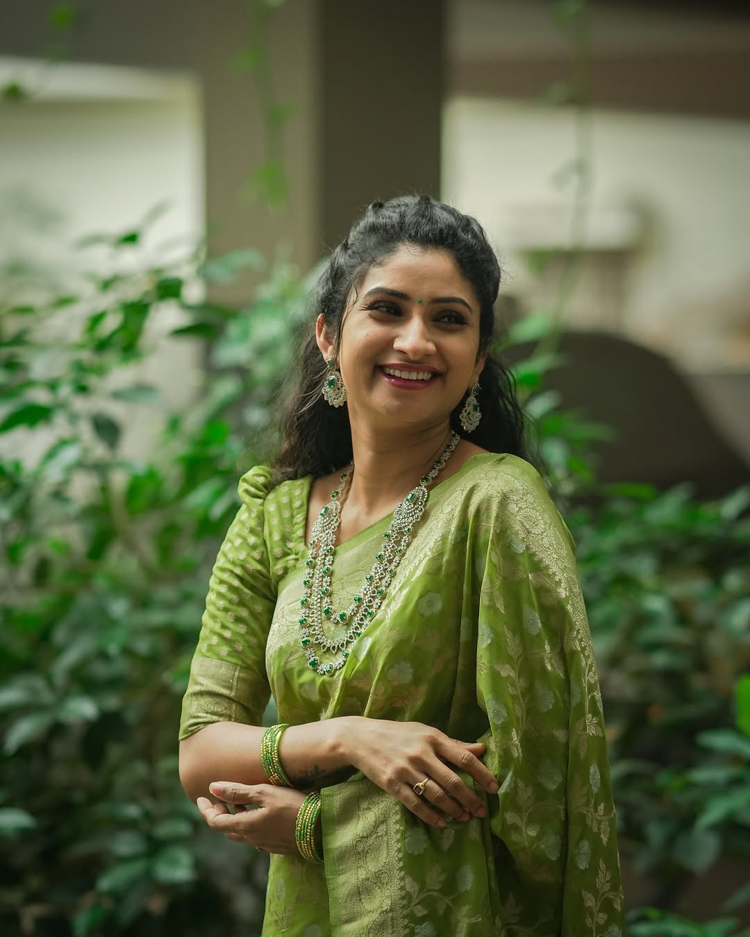 Festive Green Banarasi Saree with Subtle Zari Motifs