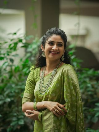 Festive Green Banarasi Saree with Subtle Zari Motifs