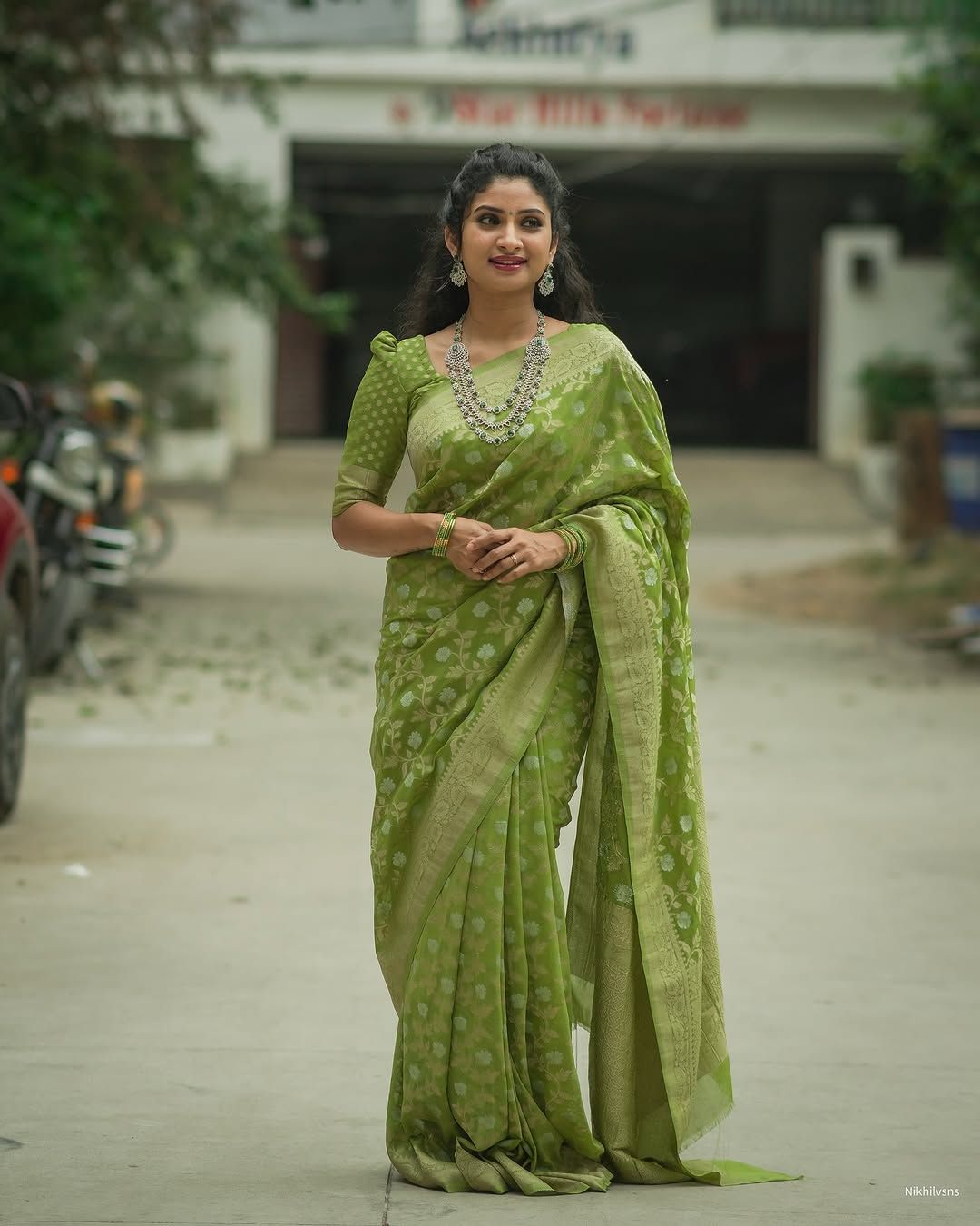 Festive Green Banarasi Saree with Subtle Zari Motifs
