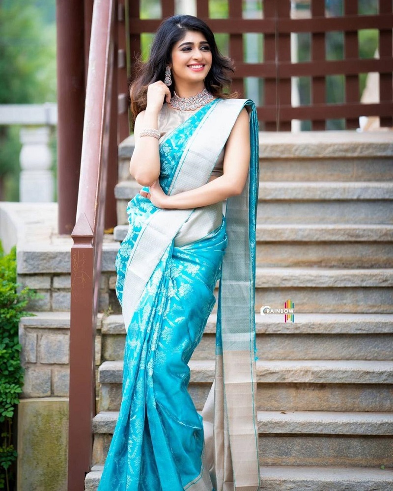 Teal Silk Saree with Silver Zari and Contrast Border