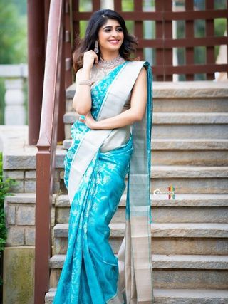 Teal Silk Saree with Silver Zari and Contrast Border