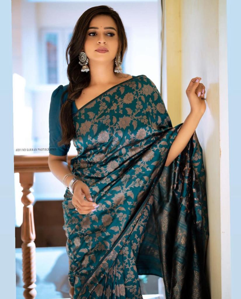 Elegant Teal Silk Saree with Floral Zari Design