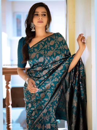 Elegant Teal Silk Saree with Floral Zari Design