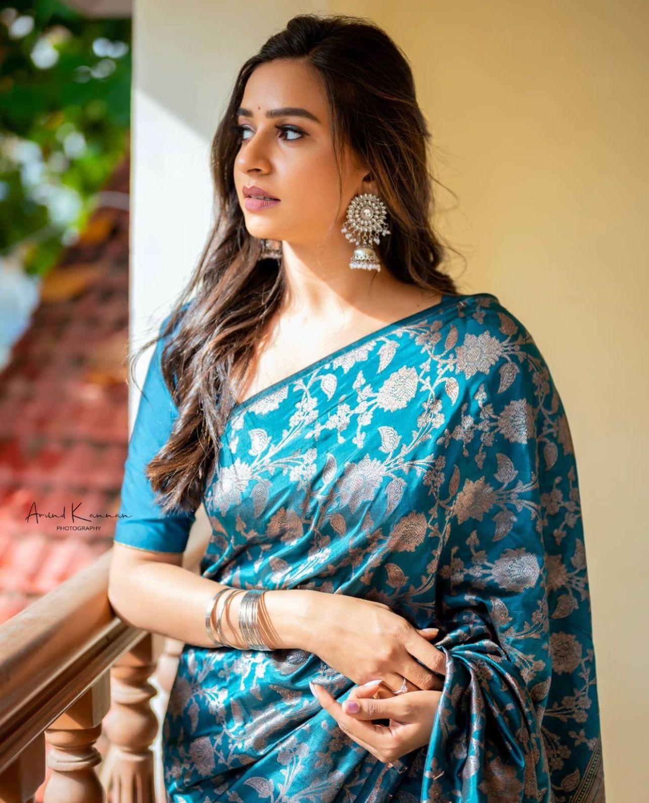 Elegant Teal Silk Saree with Floral Zari Design