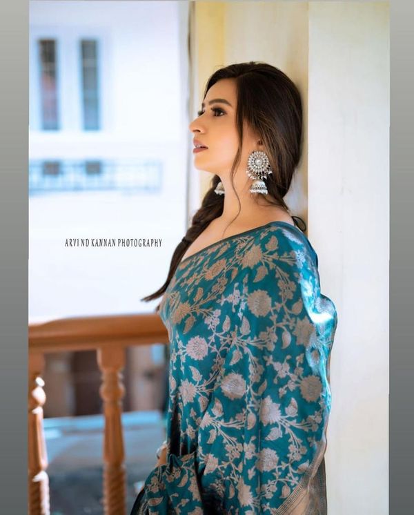 Elegant Teal Silk Saree with Floral Zari Design