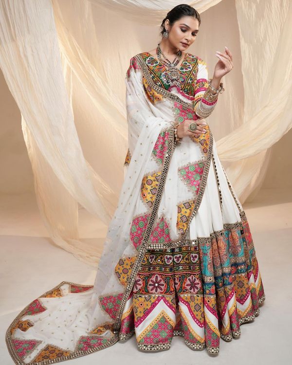 Festive White Lehenga Choli With Mirror Work Design