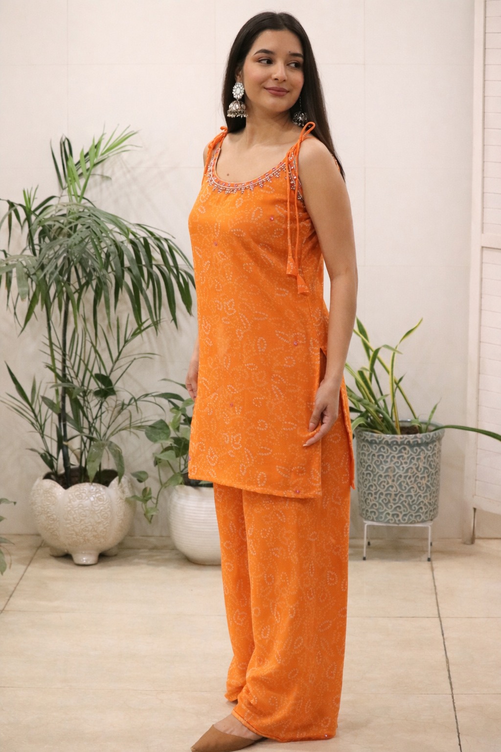 Orange Georgette Kurti Set with Mirror Work Detailing