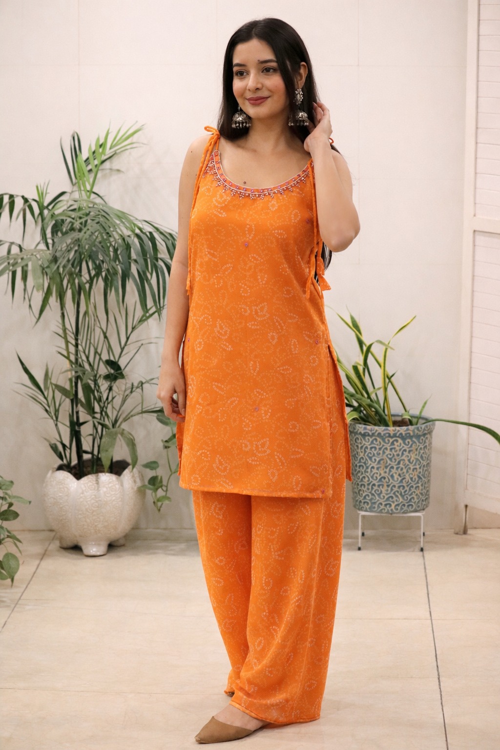 Orange Georgette Kurti Set with Mirror Work Detailing