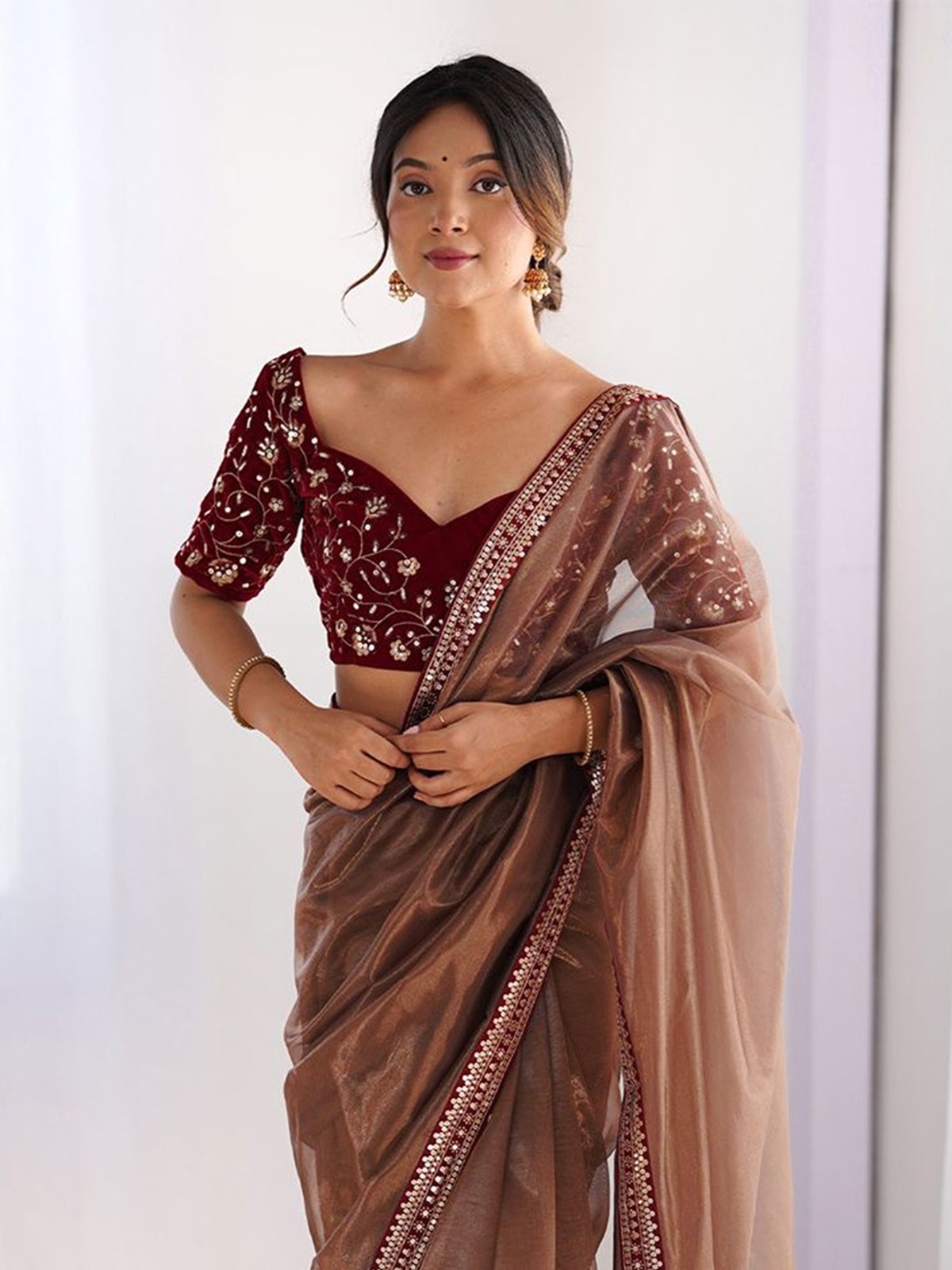 Elegant Brown Net Saree with Embroidered Blouse