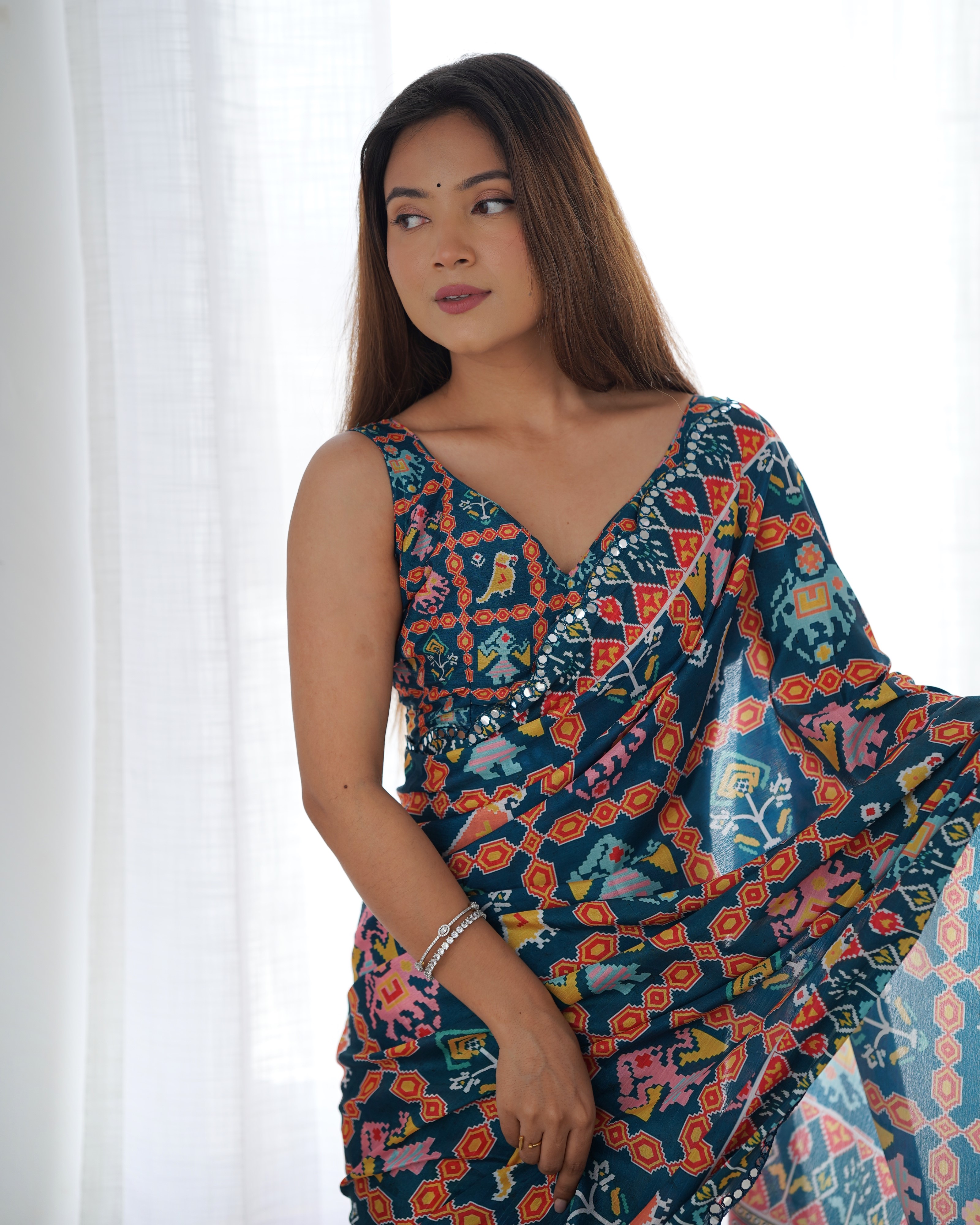 Teal Ethnic Print Chinon Saree with Mirror Border