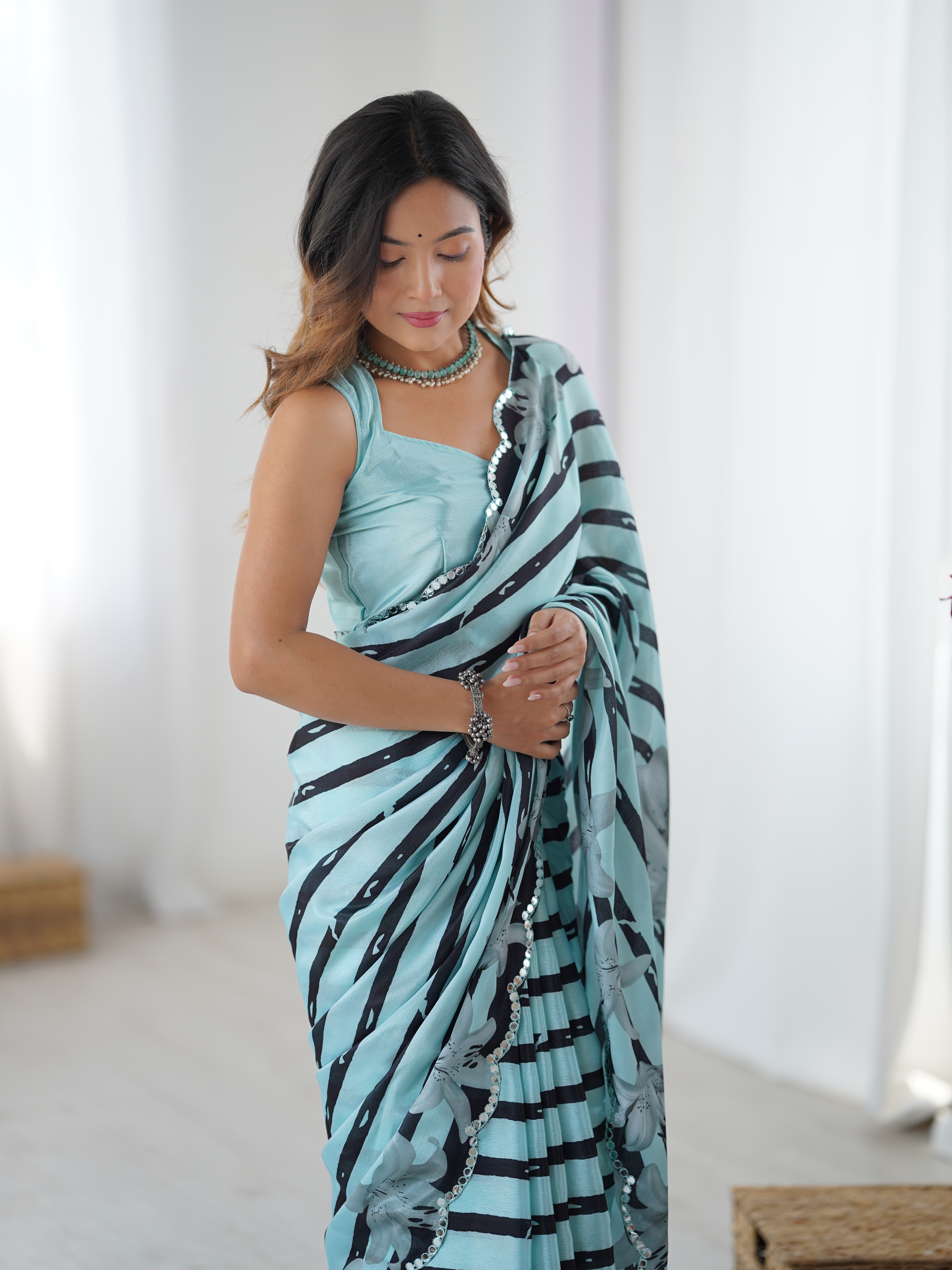 Sky Blue Floral Printed Chinnon Saree